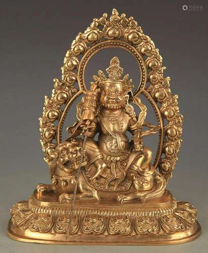 A FINE BRONZE TIBETAN TREASURE KING STATUE