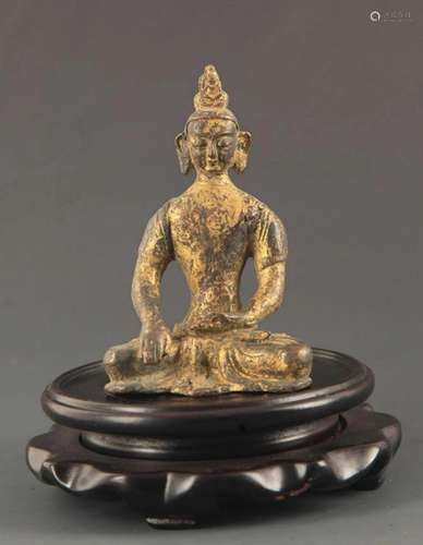 A BRONZE GILT AMITABHA FIGURE