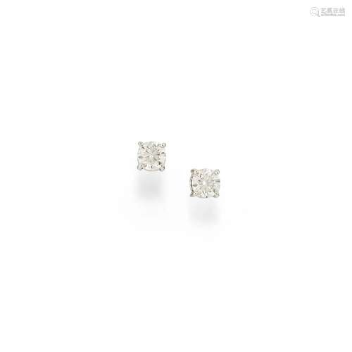 A 18K white gold and diamond earrings