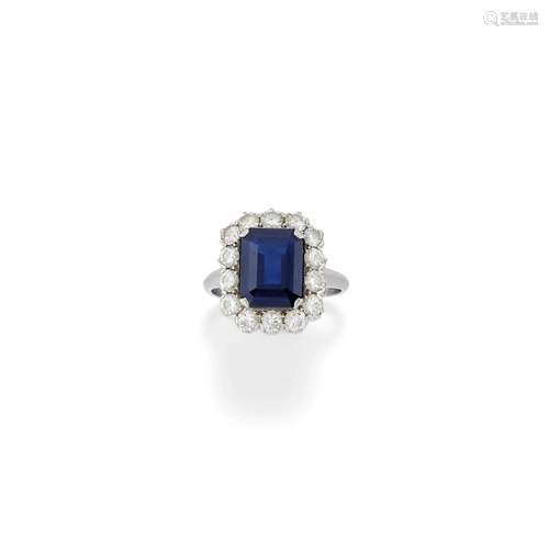 A platinum, diamond and sapphire ring