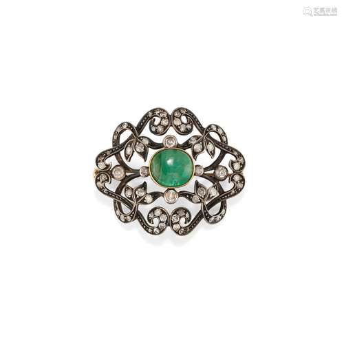 A 18K yellow gold, silver, emerald and diamond brooch