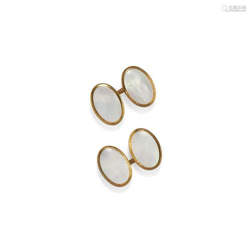 A metal gilded, mother of pearl cufflinks, 20th Century