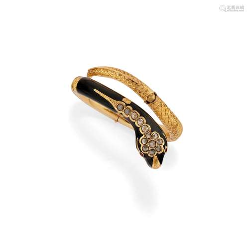 A 18K yellow gold, ruby, diamond and black enamel