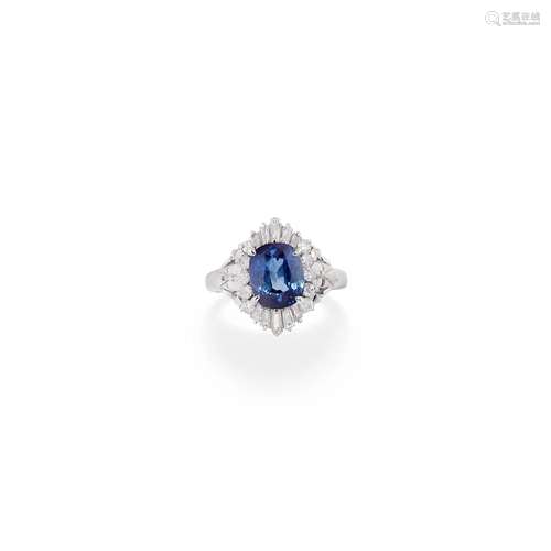 A platinum, sapphire and diamond ring