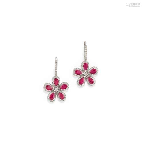 A 18K white gold, ruby and diamond earrings