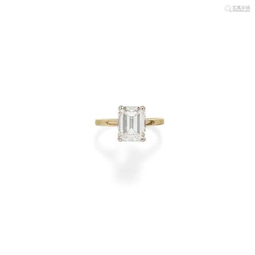 A 18K white gold and solitaire diamond ring, with