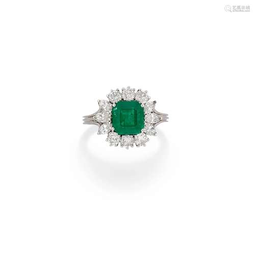 A 18K white gold, diamond and emerald ring