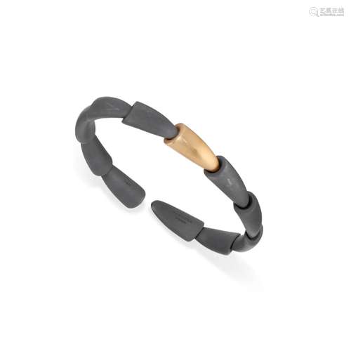 Vhernier - A 18K yellow gold and titanium bracelet,