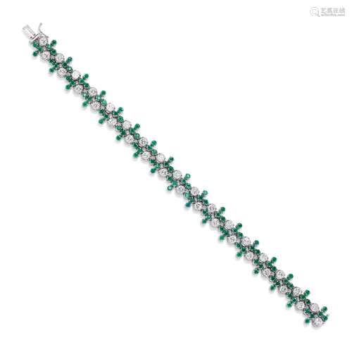 A 18K white gold, diamond and emerald bracelet