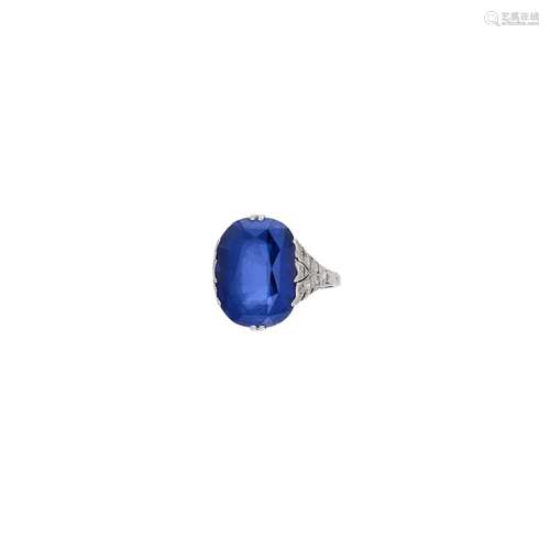 A platinum, diamond and synthetic sapphire ring, early