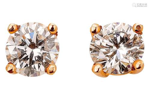 Pair of rose gold ear studs with diamonds