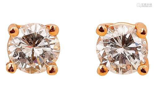 Pair of rose gold ear studs with solitaire diamond