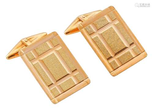 Pair of cufflinks with geometric surfaces