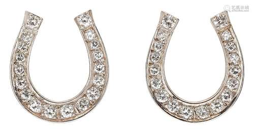 Pair of diamond ear studs in horseshoe shape