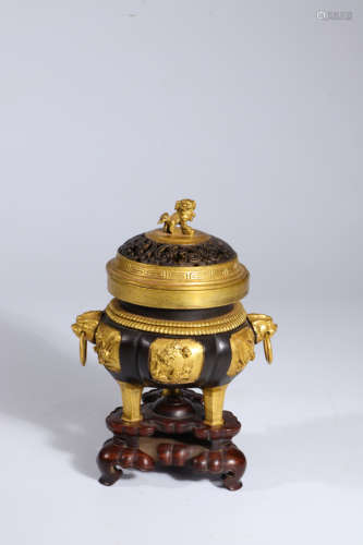 A Parcel Gilt Bronze Tripod Censer with Lion-Finial