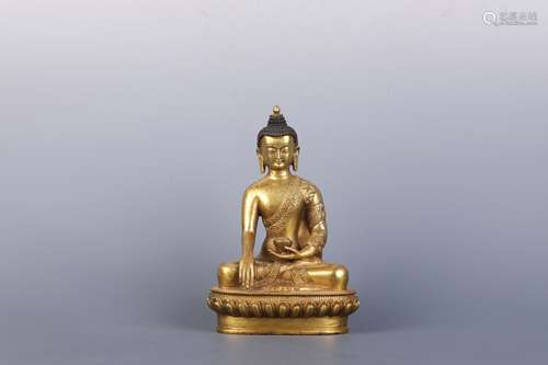 A Gilt Bronze Figure of Medicine Buddha