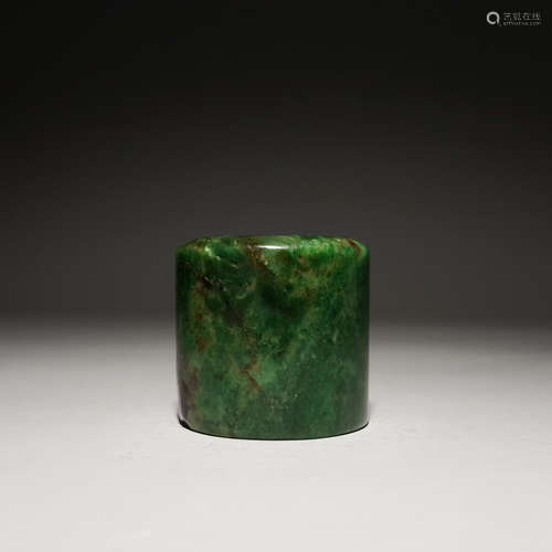 A Mottled Jadeite Thumb Ring