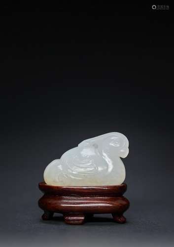 A FINE CHINESE WHITE JADE CARVING OF A MANDARIN DUCK MING OR...