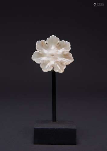 A CHINESE PALE CELADON JADE FLOWER-SHAPED PLAQUE YUAN/MING D...