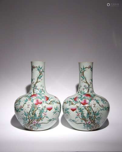 A PAIR OF LARGE CHINESE FAMILLE ROSE NINE PEACHES BOTTLE VAS...