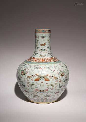 A CHINESE FAMILLE ROSE BUTTERFLY AND PRUNUS BOTTLE VASE 19TH...