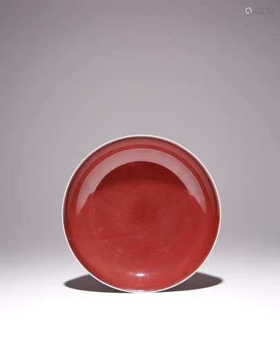 A CHINESE COPPER-RED GLAZED DISH SIX CHARACTER QIANLONG MARK...