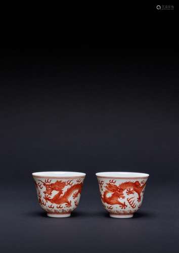 A PAIR OF FINE CHINESE IMPERIAL IRON-RED DRAGON WINE CUPS SI...