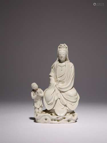 A CHINESE BLANC DE CHINE FIGURE OF GUANYIN LATE MING DYNASTY...