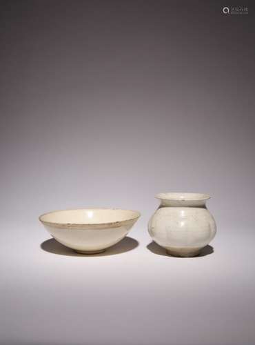 A CHINESE DING WHITE GLAZED BOWL AND A CIZHOU WHITE GLAZED J...