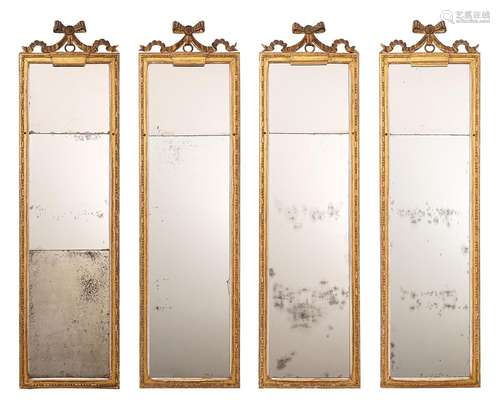 Set of four Louis XVI bow mirrors