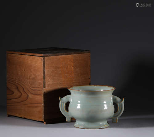 Celadon double ear stove in Song Dynasty