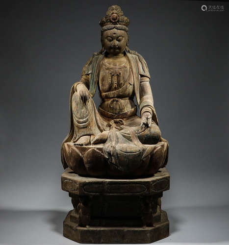 In the Ming Dynasty, wooden painted lotus Guanyin sitting st...