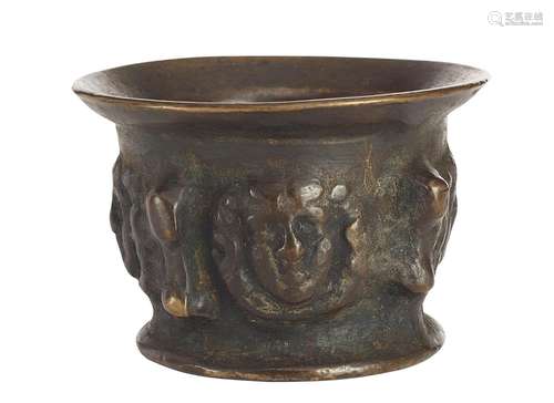 Mortar with Medusa's heads mascarons and pestle