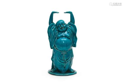 A Malachite Glazed Maitreya Figure