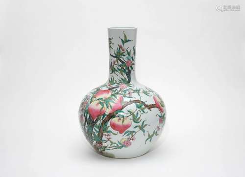 A Famille Rose Nine-Peaches Bottle Vase with Qianlong