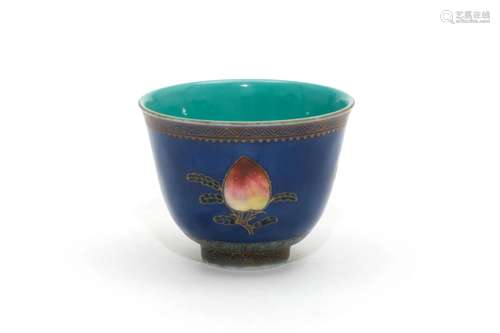 A Blue-Ground Gilt Peach and Pomegranate Cup with