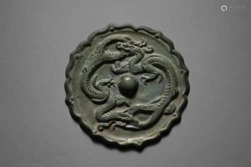 A Lobed Double Dragon Bronze Mirror Liao Dynasty