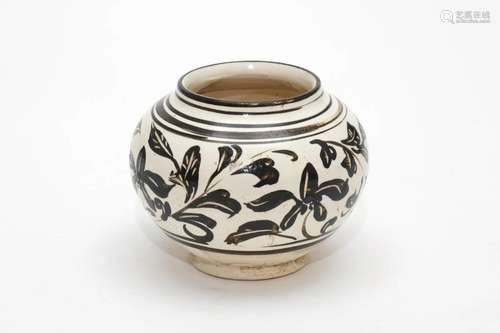 A Cizhou Ware White Ground Floral Jar