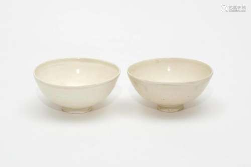 A Pair of Ding Ware White Glazed Tea Bowls