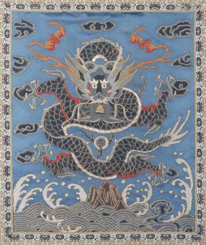 A CHINESE EMBROIDERED SILK DRAGON PANEL QING DYNASTY Depicti...