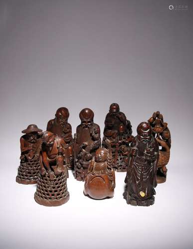 EIGHT LARGE CHINESE BAMBOO FIGURES LATE QING DYNASTY Three c...