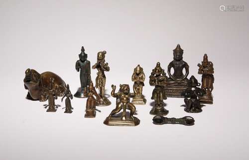 A COLLECTION OF THIRTEEN SMALL BRONZE ITEMS 17TH CENTURY AND...