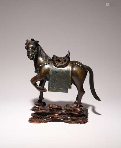 A CHINESE BRONZE AND TURQUOISE INSET INCENSE BURNER MODELLED...