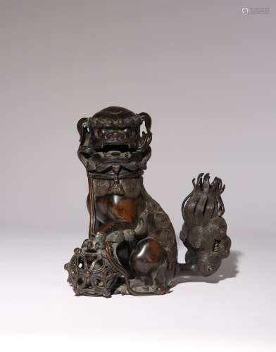 A CHINESE BRONZE LION DOG INCENSE BURNER AND COVER LATE MING...