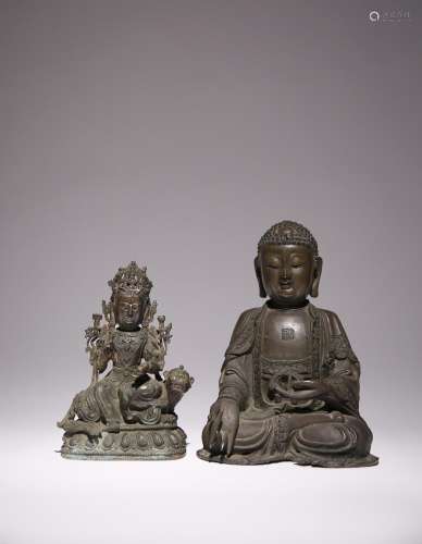 TWO CHINESE BRONZE FIGURES OF BUDDHA AND A MANJUSRI LATE MIN...