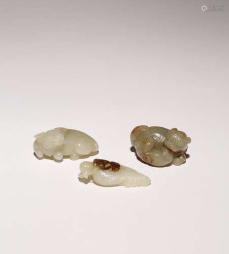 THREE CHINESE CELADON JADE ANIMAL CARVINGS QING DYNASTY OR L...