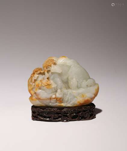 A CHINESE CELADON JADE BOULDER QING DYNASTY OR LATER Carved ...