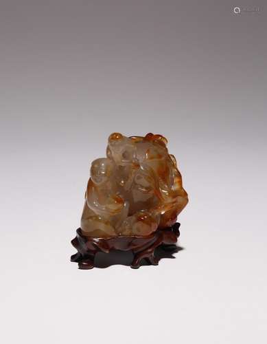 A CHINESE AGATE BOYS AND PEACH WATERPOT LATE QING DYNASTY Ca...