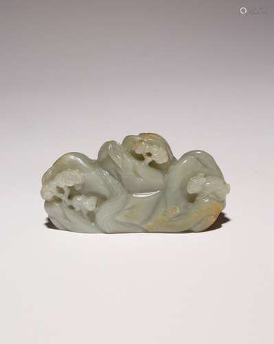 A CHINESE CELADON JADE MOUNTAIN BRUSH REST, BISHAN QING DYNA...