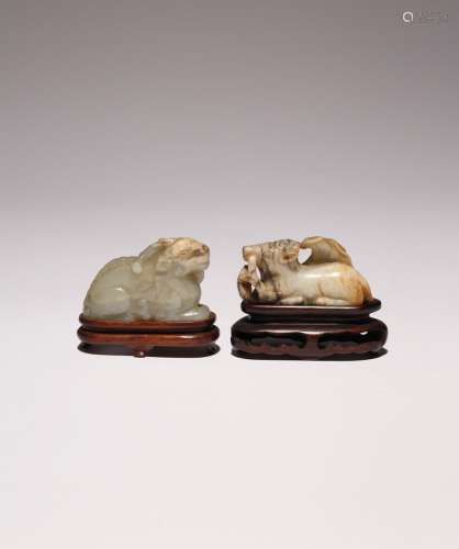 TWO CHINESE PALE CELADON JADE CARVINGS OF A RAM AND GOAT MIN...